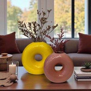 Donut shaped ceramic vase

Modern decorative flower vase

Unique round ceramic vase décor

Stylish home décor vases

Minimalist ceramic vase for living room

Decorative vase for dried flowers

Modern art vase for home and office

Donut ring flower vase

Creative ceramic vase design

Aesthetic home décor accessories