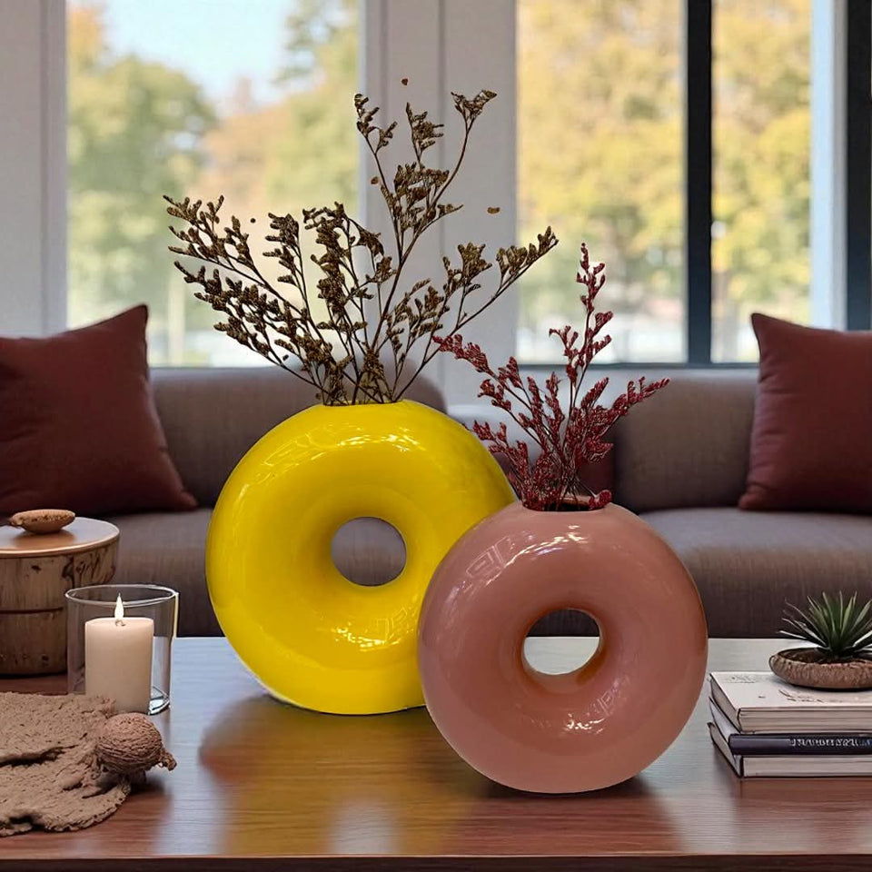 Donut shaped ceramic vase

Modern decorative flower vase

Unique round ceramic vase décor

Stylish home décor vases

Minimalist ceramic vase for living room

Decorative vase for dried flowers

Modern art vase for home and office

Donut ring flower vase

Creative ceramic vase design

Aesthetic home décor accessories
